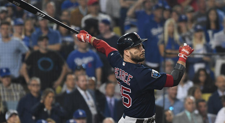 Red Sox first baseman Steve Pearce hits a three-RBI double in the ninth inning of Game 4 of the World Series against the Dodgers at Dodger Stadium in Los Angeles. Red Sox first baseman Steve Pearce hits a three-RBI double in the ninth inning of Game 4 of the World Series against the Dodgers at Dodger Stadium in Los Angeles.