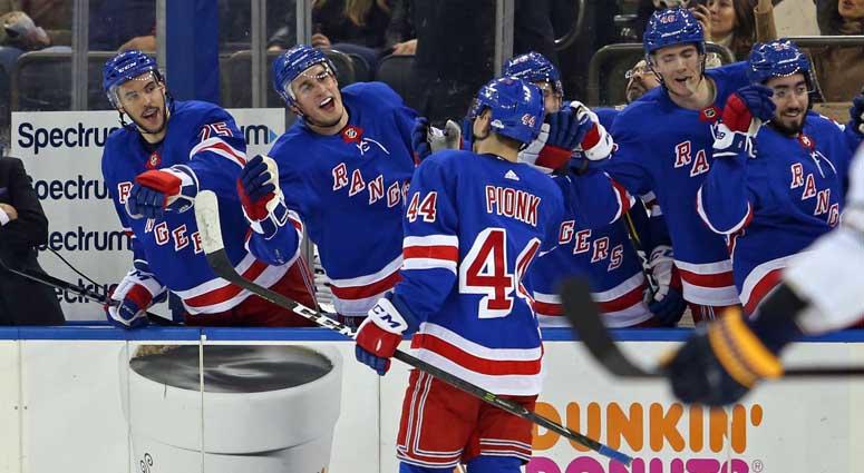 New York Rangers defenseman Neal Pionk (44) celebrates his first career NHL goal against the Buffalo Sabres on March 24, 2018, at Madison Square Garden. New York Rangers defenseman Neal Pionk (44) celebrates his first career NHL goal against the Buffalo Sabres on March 24, 2018, at Madison Square Garden.