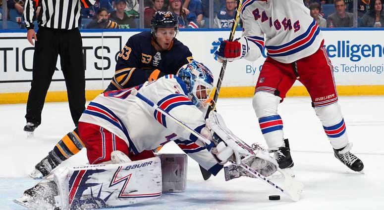 Sabres left wing Jeff Skinner and Rangers goaltender Henrik Lundqvist go after a rebound on Oct. 7, 2018, at KeyBank Center in Buffalo, New York. Sabres left wing Jeff Skinner and Rangers goaltender Henrik Lundqvist go after a rebound on Oct. 7, 2018, at KeyBank Center in Buffalo, New York.