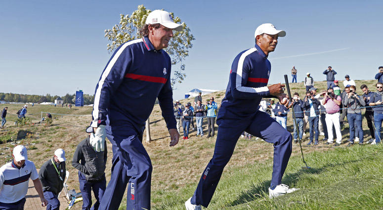 Phil Mickelson and Tiger Woods walk to the 7th tee during a Ryder Cup practice round on Sept. 25, 2018, at Le Golf National in Saint-Quentin-en-Yvelines, France. Phil Mickelson and Tiger Woods walk to the 7th tee during a Ryder Cup practice round on Sept. 25, 2018, at Le Golf National in Saint-Quentin-en-Yvelines, France.