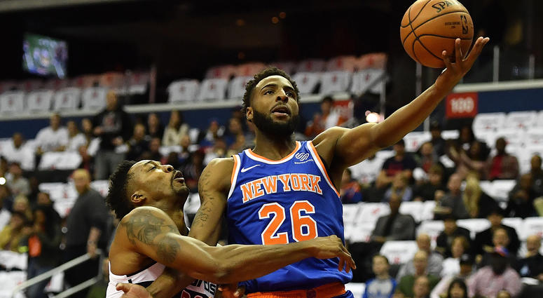 Nov 4, 2018; Washington, DC, USA; New York Knicks center Mitchell Robinson (26) is fouled by Washington Wizards center Dwight Howard (21) during the first half at Capital One. Mandatory Credit: Brad Mills-USA TODAY Sports Nov 4, 2018; Washington, DC, USA; New York Knicks center Mitchell Robinson (26) is fouled by Washington Wizards center Dwight Howard (21) during the first half at Capital One. Mandatory Credit: Brad Mills-USA TODAY Sports