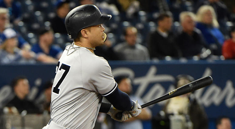 Yankees left fielder Giancarlo Stanton hits a solo home run against the Blue Jays in the 13th inning on June 6, 2018, at the Rogers Centre in Toronto. Yankees left fielder Giancarlo Stanton hits a solo home run against the Blue Jays in the 13th inning on June 6, 2018, at the Rogers Centre in Toronto.
