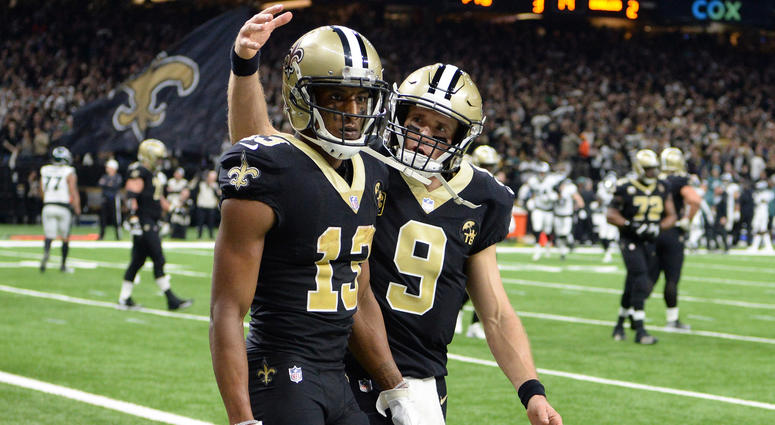 Michael Thomas reacts with quarterback Drew Brees after catching a pass for a touchdown against the Philadelphia Eagles during the third quarter of a NFC Divisional playoff football game at Superdome. Mandatory Credit: John David Mercer-USA TODAY Sports Michael Thomas reacts with quarterback Drew Brees after catching a pass for a touchdown against the Philadelphia Eagles during the third quarter of a NFC Divisional playoff football game at Superdome. Mandatory Credit: John David Mercer-USA TODAY Sports