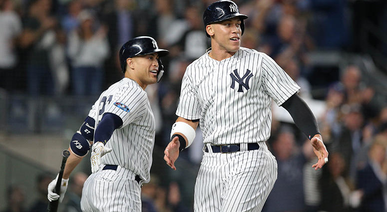 Oct 3, 2018; Yankees Aaron Judge and Giancarlo Stanton celebrate during the sixth inning against the Oakland Athletics in the 2018 American League wild card playoff baseball game. Brad Penner-USA TODAY Sports Oct 3, 2018; Yankees Aaron Judge and Giancarlo Stanton celebrate during the sixth inning against the Oakland Athletics in the 2018 American League wild card playoff baseball game. Brad Penner-USA TODAY Sports