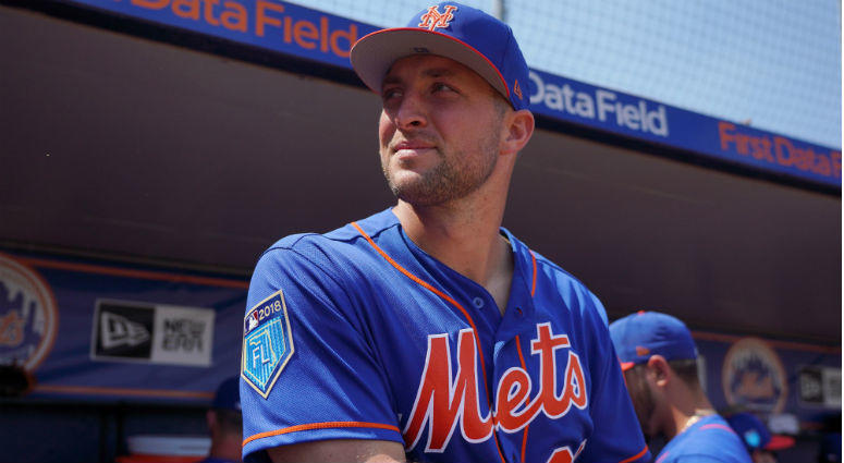 Tim Tebow looks on from the dugout prior to the spring training game against the Miami Marlins at First Data Field. Tim Tebow looks on from the dugout prior to the spring training game against the Miami Marlins at First Data Field.
