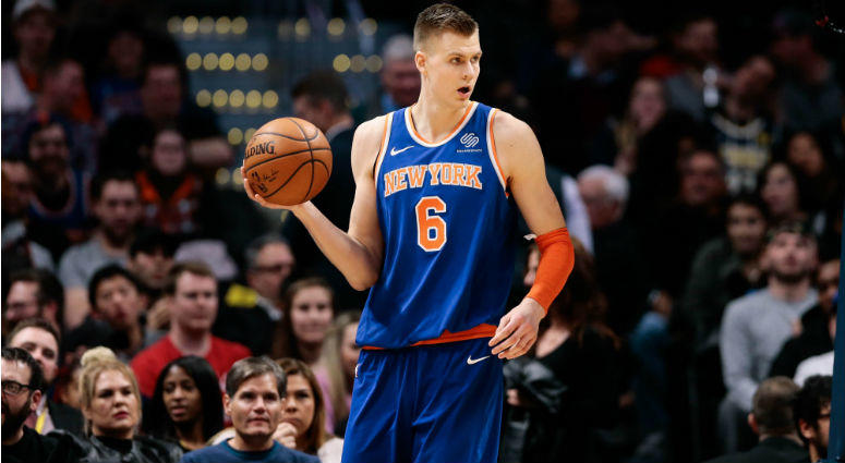 Kristaps Porzingis controls the ball in the fourth quarter against the Denver Nuggets at the Pepsi Center in Denver, CO. Kristaps Porzingis controls the ball in the fourth quarter against the Denver Nuggets at the Pepsi Center in Denver, CO.