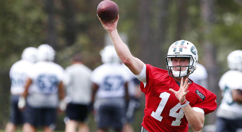 New York Jets quarterback Sam Darnold (14) throws the ball during New York Jets rookie mini camp at Atlantic Health Training Center. New York Jets quarterback Sam Darnold (14) throws the ball during New York Jets rookie mini camp at Atlantic Health Training Center.