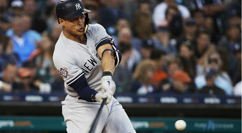 Giancarlo Stanton hits a home run in the sixth inning against the Detroit Tigers at Comerica Park in Detroit. Giancarlo Stanton hits a home run in the sixth inning against the Detroit Tigers at Comerica Park in Detroit.