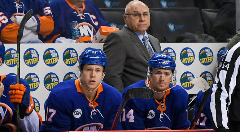 Barry Trotz looks on from behind the bench against the Washington Capitals during the third period at Barclays Center. Barry Trotz looks on from behind the bench against the Washington Capitals during the third period at Barclays Center.