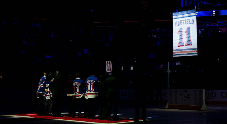 The banner for Vic Hadfield is raised during the jersey retirement for Vic Hadfield at Madison Square Garden. The banner for Vic Hadfield is raised during the jersey retirement for Vic Hadfield at Madison Square Garden.