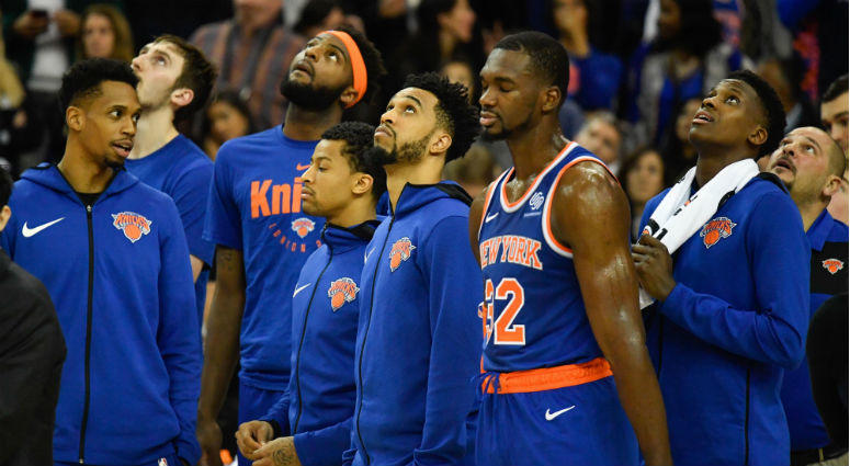New York Knicks players look up at the videotron while the officials decide on the timing of the final basket during the fourth quarter of the game against the Washington Wizards at The O2 Arena. New York Knicks players look up at the videotron while the officials decide on the timing of the final basket during the fourth quarter of the game against the Washington Wizards at The O2 Arena.