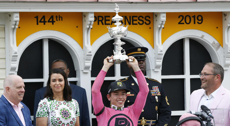 Tyler Gaffalione holds the Woodlawn Vase after winning the 144th running of the Preakness Stakes aboard War of Will at Pimlico Race Course. Tyler Gaffalione holds the Woodlawn Vase after winning the 144th running of the Preakness Stakes aboard War of Will at Pimlico Race Course.
