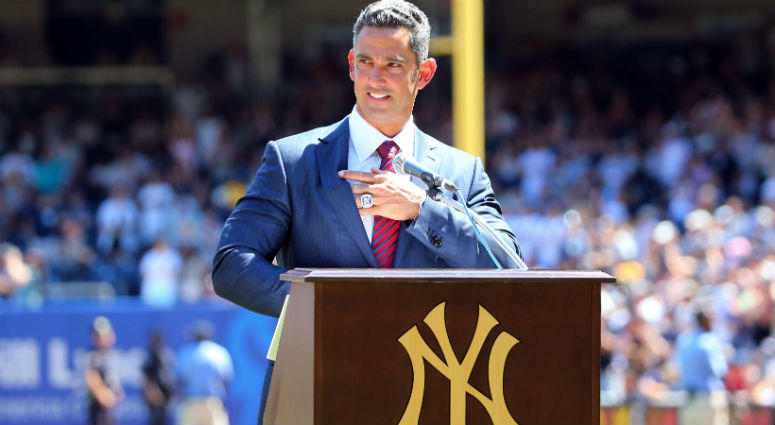 Jorge Posada address the crowd during a ceremony for the retirement of his number before the game against the Cleveland Indians at Yankee Stadium Jorge Posada address the crowd during a ceremony for the retirement of his number before the game against the Cleveland Indians at Yankee Stadium
