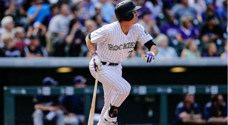 Jordan Patterson follows his ball on an RBI double in the fifth inning against the Milwaukee Brewers at Coors Field Jordan Patterson follows his ball on an RBI double in the fifth inning against the Milwaukee Brewers at Coors Field