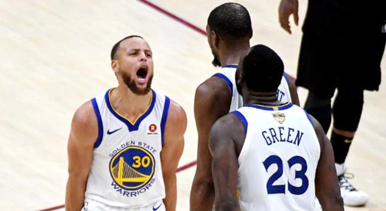 Warriors guard Stephen Curry celebrates with teammates during the fourth quarter against the Cleveland Cavaliers in Game 3 of the NBA Finals on June 6, 2018, at Quicken Loans Arena. Warriors guard Stephen Curry celebrates with teammates during the fourth quarter against the Cleveland Cavaliers in Game 3 of the NBA Finals on June 6, 2018, at Quicken Loans Arena.