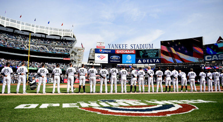 The New York Yankees stand for the national anthem before their game against the Baltimore Orioles on opening day at Yankee Stadium on March 28, 2019. The New York Yankees stand for the national anthem before their game against the Baltimore Orioles on opening day at Yankee Stadium on March 28, 2019.