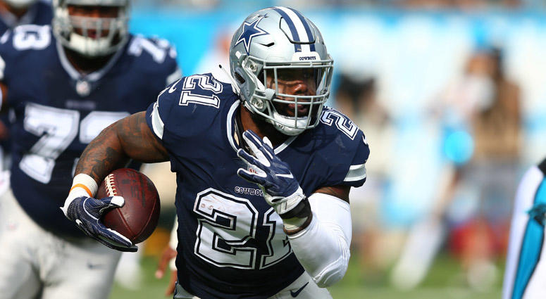 Cowboys running back Ezekiel Elliott runs the ball against the Carolina Panthers on Sept. 9, 2018, at Bank of America Stadium in Charlotte, North Carolina. Cowboys running back Ezekiel Elliott runs the ball against the Carolina Panthers on Sept. 9, 2018, at Bank of America Stadium in Charlotte, North Carolina.