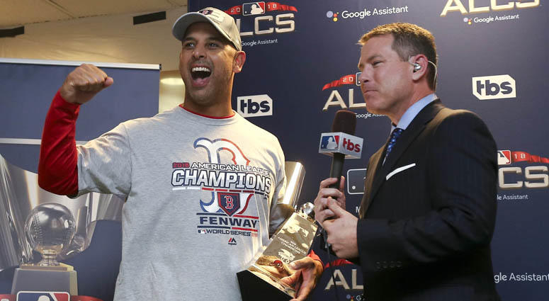 Boston Red Sox manager Alex Cora celebrates with the William Harridge Trophy iafter defeating the Houston Astros in Game 5 of the ALCS on Oct. 18, 2018, at Minute Maid Park in Houston. Boston Red Sox manager Alex Cora celebrates with the William Harridge Trophy iafter defeating the Houston Astros in Game 5 of the ALCS on Oct. 18, 2018, at Minute Maid Park in Houston.