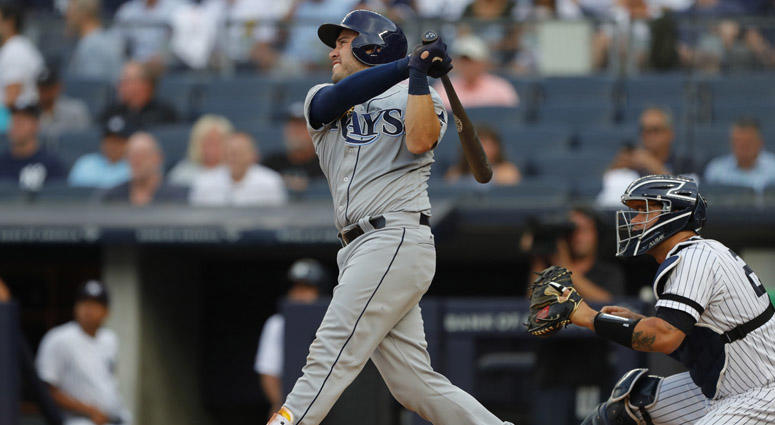 Tampa Bay Rays catcher Travis d'Arnaud hits home run against the Yankees in the first inning at Yankee Stadium on July 15, 2019. Tampa Bay Rays catcher Travis d'Arnaud hits home run against the Yankees in the first inning at Yankee Stadium on July 15, 2019.