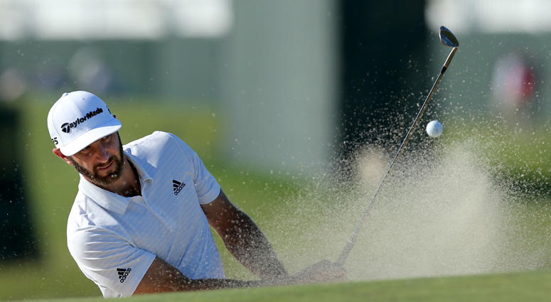 Dustin Johnson hits out of a sand trap onto the second green during Tuesday's practice round for the 118th U.S. Open golf tournament on June 12, 2018, at Shinnecock Hills in Southampton. Dustin Johnson hits out of a sand trap onto the second green during Tuesday's practice round for the 118th U.S. Open golf tournament on June 12, 2018, at Shinnecock Hills in Southampton.