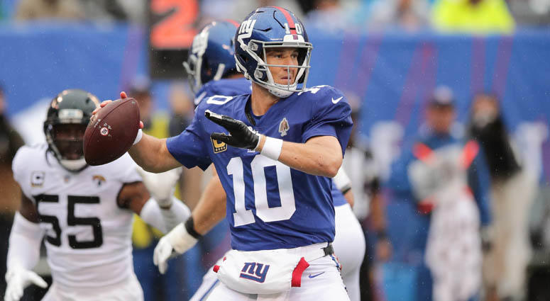 Giants quarterback Eli Manning passes the ball in front of Jacksonville Jaguars defensive end Lerentee McCray on Sept. 9, 2018, at MetLife Stadium. Giants quarterback Eli Manning passes the ball in front of Jacksonville Jaguars defensive end Lerentee McCray on Sept. 9, 2018, at MetLife Stadium.