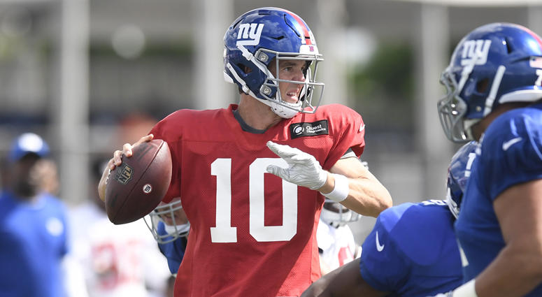 Giants quarterback Eli Manning (10) looks for an open receiver during training camp on Aug. 1, 2018, in East Rutherford, New Jersey. Giants quarterback Eli Manning (10) looks for an open receiver during training camp on Aug. 1, 2018, in East Rutherford, New Jersey.