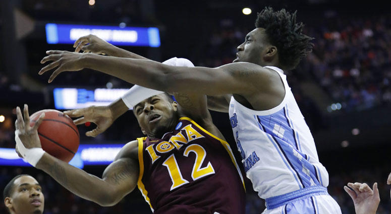 North Carolina Tar Heels forward Nassir Little (5) knocks the ball away from Iona Gaels forward Tajuan Agee (12) in the first half in the first round of the NCAA Tournament on March 22, 2019, in Columbus, Ohio. North Carolina Tar Heels forward Nassir Little (5) knocks the ball away from Iona Gaels forward Tajuan Agee (12) in the first half in the first round of the NCAA Tournament on March 22, 2019, in Columbus, Ohio.