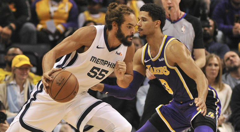 Grizzlies center Joakim Noah dribbles the ball as Lakers guard Josh Hart defends on Dec. 8, 2018, at the FedExForum in Memphis. Grizzlies center Joakim Noah dribbles the ball as Lakers guard Josh Hart defends on Dec. 8, 2018, at the FedExForum in Memphis.