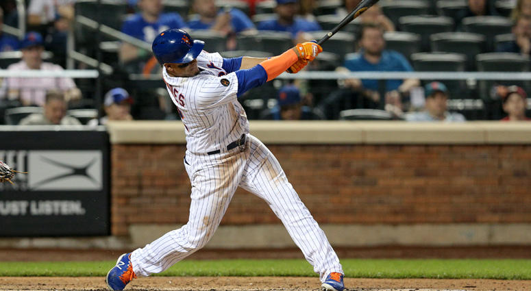 Mets center fielder Juan Lagares hits a two-run single against the Toronto Blue Jays during the fourth inning on May 15, 2018, at Citi Field. Mets center fielder Juan Lagares hits a two-run single against the Toronto Blue Jays during the fourth inning on May 15, 2018, at Citi Field.