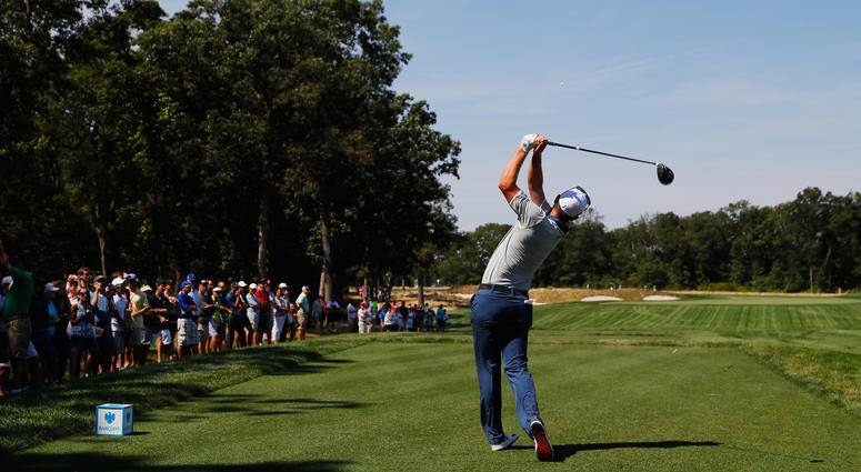 Justin Rose hits his tee shot on the 12th hole during the third round of The Barclays on the Black Course at Bethpage State Park on Aug. 27, 2016. Justin Rose hits his tee shot on the 12th hole during the third round of The Barclays on the Black Course at Bethpage State Park on Aug. 27, 2016.