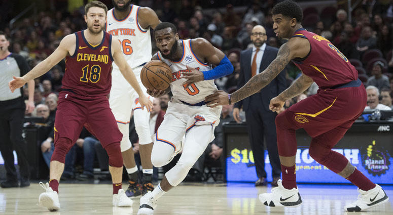 Knicks guard Kadeem Allen drives to the basket between Cavaliers guard Matthew Dellavedova (18) and forward Marquese Chriss (3) on Feb. 11, 2019, at Quicken Loans Arena in Cleveland. Knicks guard Kadeem Allen drives to the basket between Cavaliers guard Matthew Dellavedova (18) and forward Marquese Chriss (3) on Feb. 11, 2019, at Quicken Loans Arena in Cleveland.