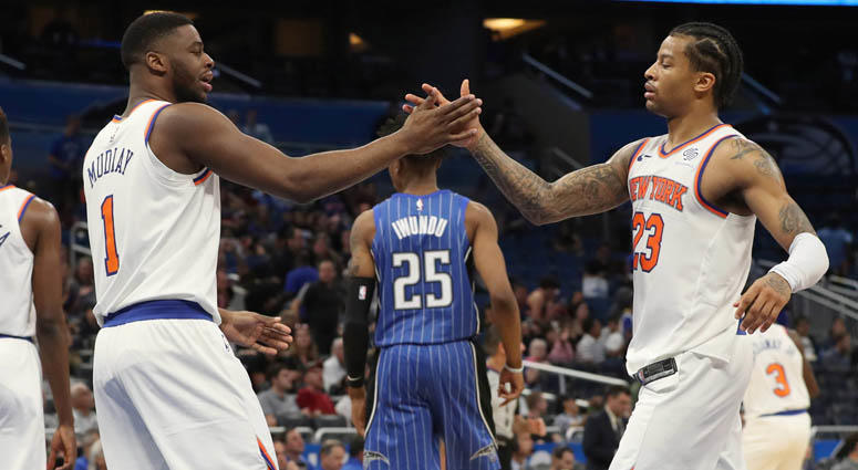 Trey Burke (right) and Emmanuel Mudiay Trey Burke (right) and Emmanuel Mudiay