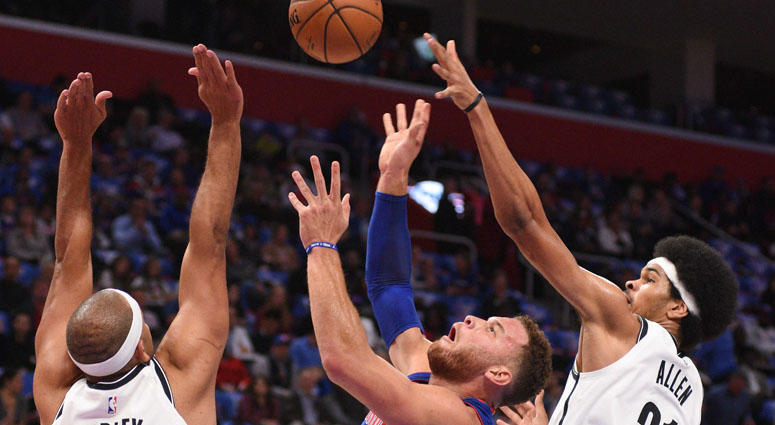 Detroit Pistons forward Blake Griffin (23) goes to the basket as Brooklyn Nets forward Jared Dudley (6) and center Jarrett Allen defend on Oct. 16, 2018, at Little Caesars Arena in Detroit. Detroit Pistons forward Blake Griffin (23) goes to the basket as Brooklyn Nets forward Jared Dudley (6) and center Jarrett Allen defend on Oct. 16, 2018, at Little Caesars Arena in Detroit.