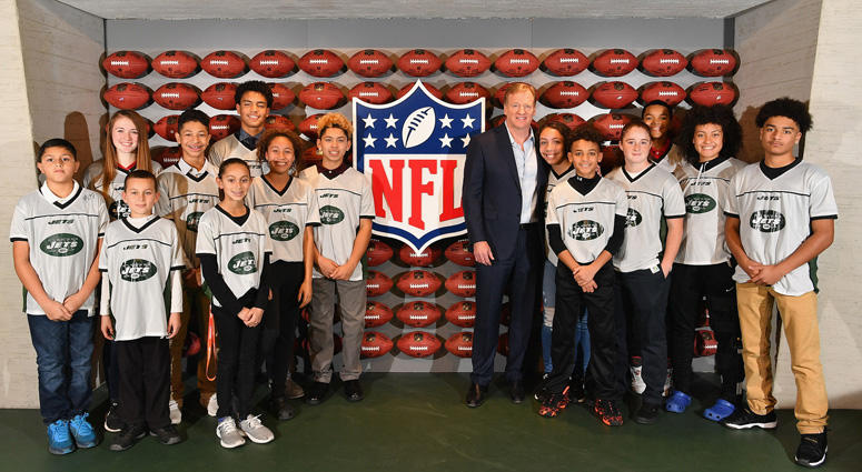 NFL Commissioner Roger Goodell poses for a photo with the Jets 13-14 girls and boys NFL flag champions during the NFL Experience Times Square opening celebration on Nov. 30, 2017. NFL Commissioner Roger Goodell poses for a photo with the Jets 13-14 girls and boys NFL flag champions during the NFL Experience Times Square opening celebration on Nov. 30, 2017.