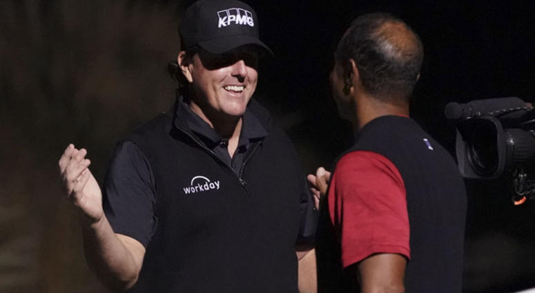 Phil Mickelson (left) shakes hands with Tiger Woods (right) after The Match: Tiger vs Phil golf match at Shadow Creek Golf Course in Las Vegas on Nov. 23, 2018. Phil Mickelson (left) shakes hands with Tiger Woods (right) after The Match: Tiger vs Phil golf match at Shadow Creek Golf Course in Las Vegas on Nov. 23, 2018.