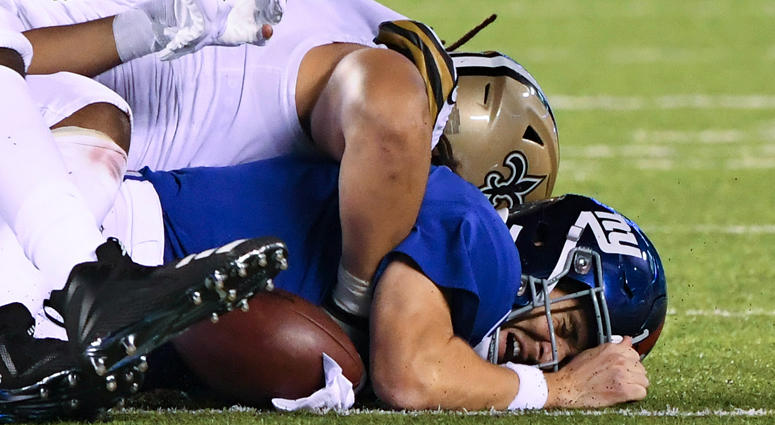 Giants quarterback Eli Manning fumbles the ball against the Saints late in the fourth quarter on Sept. 30, 2018, at MetLife Stadium. Giants quarterback Eli Manning fumbles the ball against the Saints late in the fourth quarter on Sept. 30, 2018, at MetLife Stadium.