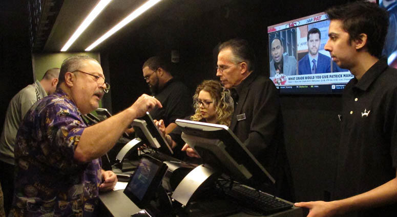 A gambler places a sports bet at Resorts Casino in Atlantic City, New Jersey. Numerous U.S. states are considering joining the seven that currently offer legal sports betting. A gambler places a sports bet at Resorts Casino in Atlantic City, New Jersey. Numerous U.S. states are considering joining the seven that currently offer legal sports betting.