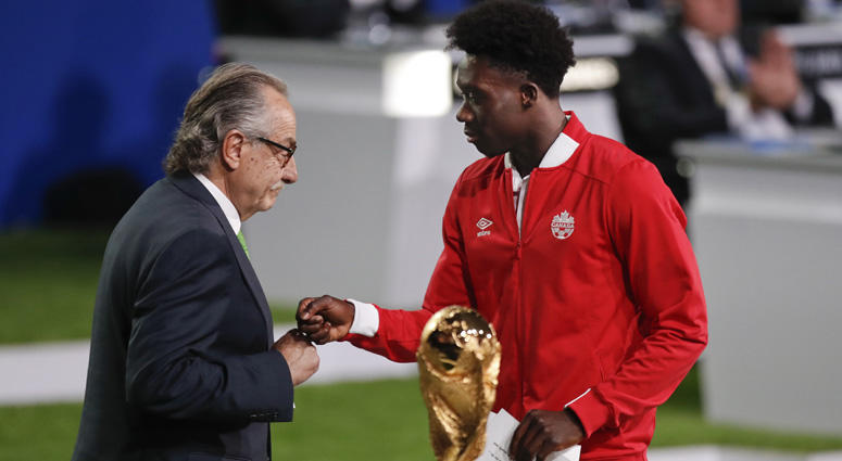 Decio de Maria, president of the Football Association of Mexico (left) and Canadian soccer player Alphonso Davies present a joint bid by Canada, Mexico and the United States to host the 2026 World Cup at the FIFA congress in Moscow on June 13, 2018. Decio de Maria, president of the Football Association of Mexico (left) and Canadian soccer player Alphonso Davies present a joint bid by Canada, Mexico and the United States to host the 2026 World Cup at the FIFA congress in Moscow on June 13, 2018.