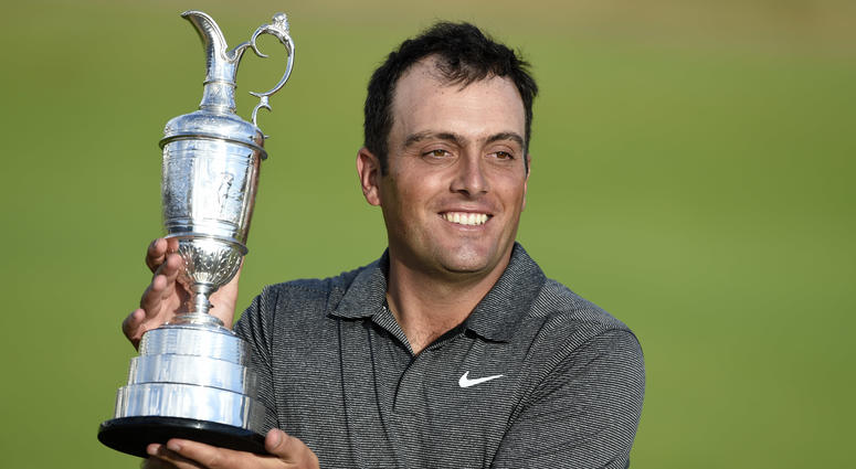 Francesco Molinari holds the Claret Jug after winning the 147th Open Championship. Francesco Molinari holds the Claret Jug after winning the 147th Open Championship.