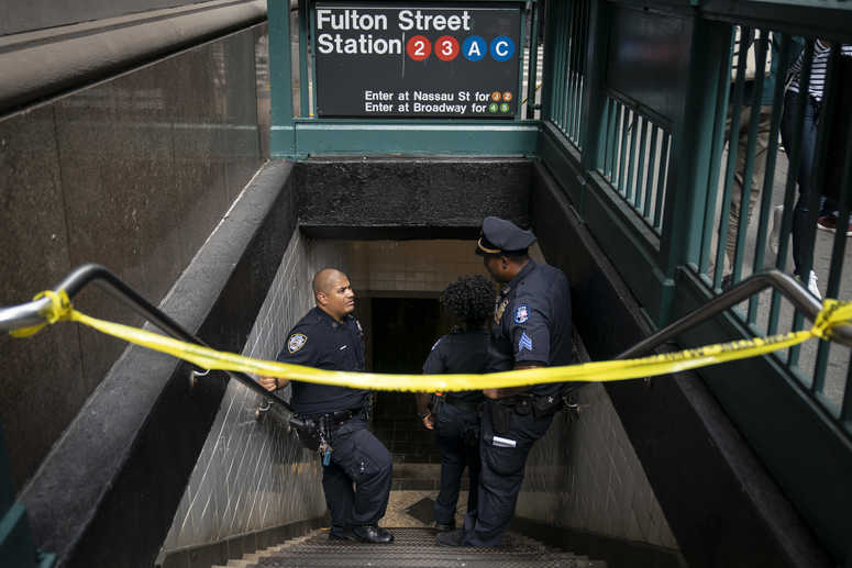 NYPD officers stand at an entrance of the Fulton Street subway station where there were reports of a suspicious package in Lower Manhattan on August 16, 2019 in New York City. Bomb scare rice cooker