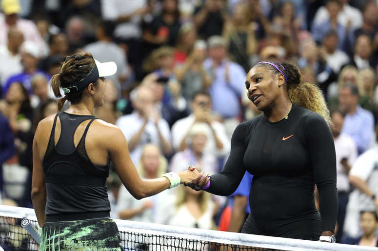 Serena Williams of the United States meets Qiang Wang of China at the net after defeating her on day nine of the 2019 US Open ( Al Bello/Getty Images)