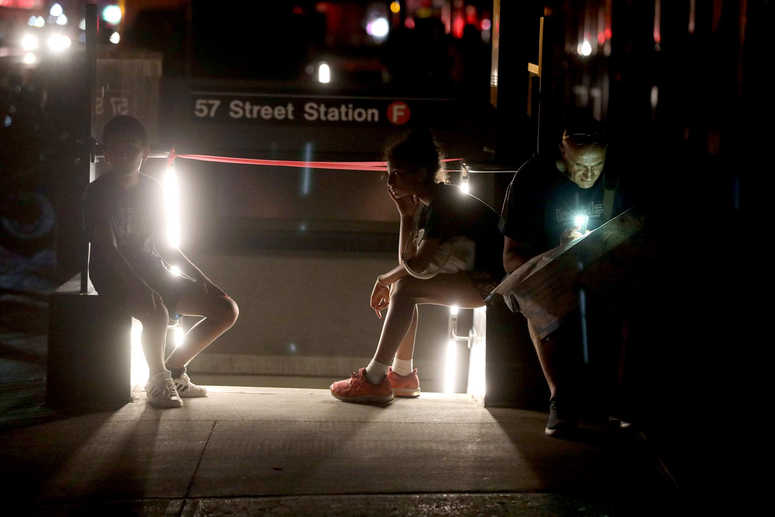 Tourists from Italy try to find a way back to their hotel in Brooklyn after the subways shut down due to a power outage that left large parts of the West Side of Manhattan without power July 13, 2019. NYC power outage