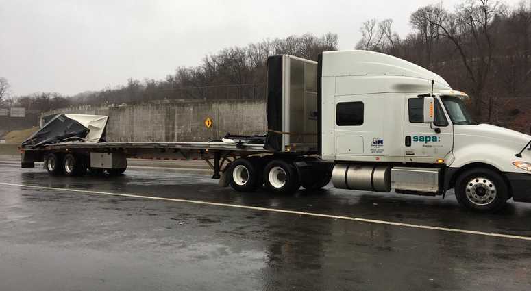Tractor-Trailer's Canvas-Sided Trailer Shredded by high winds on the Tappan Zee Bridge.