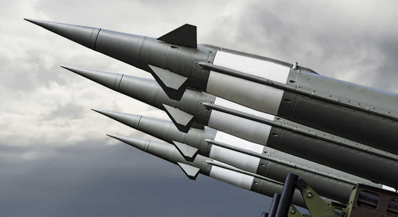 Nuclear Missles With Warhead Aimed at Stormy Sky. Nuclear Missles With Warhead Aimed at Stormy Sky.