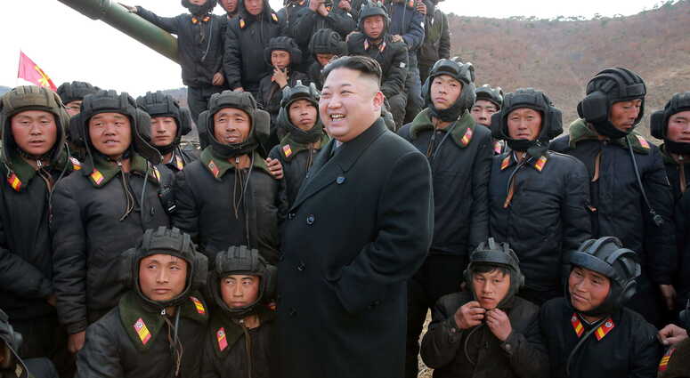 PYONGYANG, April 1, 2017 (Xinhua) -- Photo provided by Korean Central News Agency (KCNA) on April 1, 2017 shows top leader of the Democratic People's Republic of Korea (DPRK) Kim Jong Un (Front) recently guiding the Korean People's Army Tank Crews' Compet PYONGYANG, April 1, 2017 (Xinhua) -- Photo provided by Korean Central News Agency (KCNA) on April 1, 2017 shows top leader of the Democratic People's Republic of Korea (DPRK) Kim Jong Un (Front) recently guiding the Korean People's Army Tank Crews' Compet