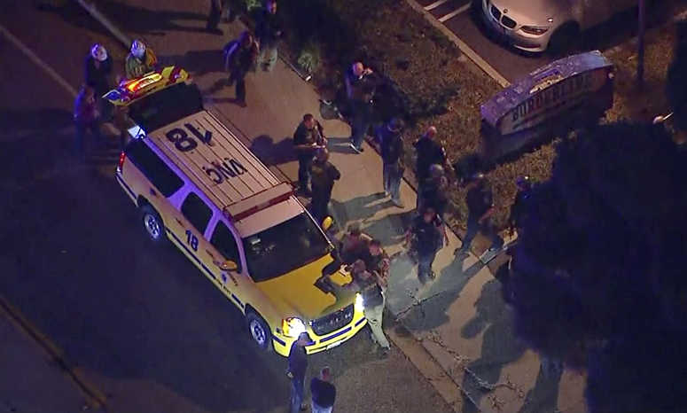 This image made from aerial video show officers around a Police SUV in the vicinity of a shooting in Thousand Oaks, California, early Thursday, Nov. 8, 2018. This image made from aerial video show officers around a Police SUV in the vicinity of a shooting in Thousand Oaks, California, early Thursday, Nov. 8, 2018.