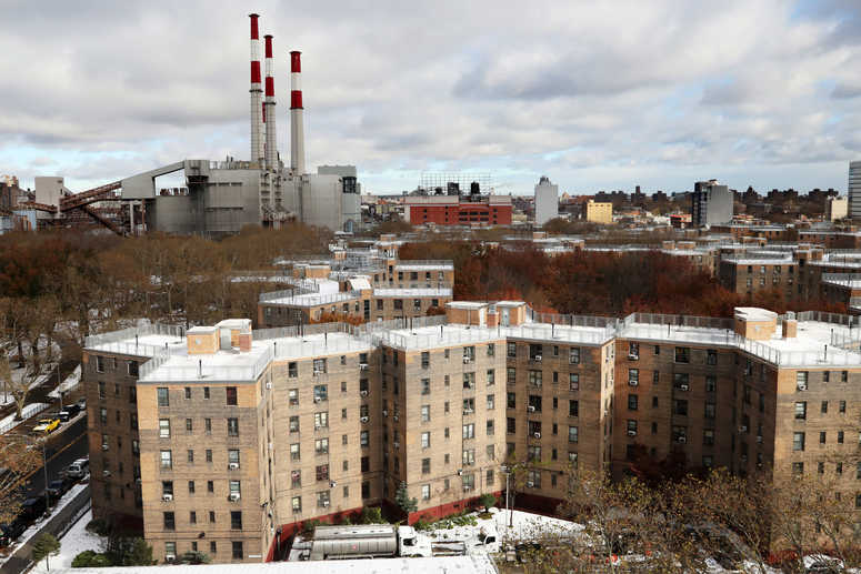 The Queensbridge Houses sit beneath the Ed Koch Queensboro Bridge, upper right, Friday, Nov. 16, 2018, in New York. Amazon LIC Headquarters