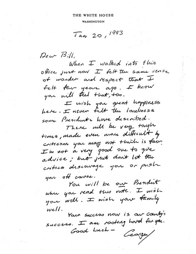 This image provided by the George H.W. Bush Presidential Library and Museum shows a note written by George H.W. Bush to Bill Clinton. George H.W. Bush