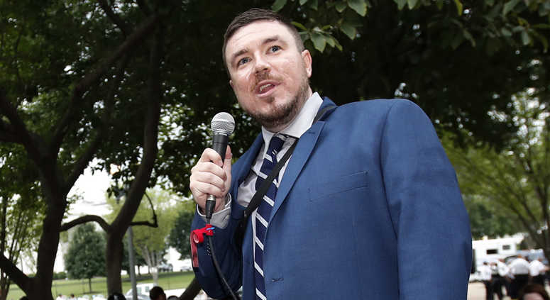 White nationalist Jason Kessler talks during a rally near the White House on the one year anniversary of the Charlottesville "Unite the Right" rally Jason Kessler