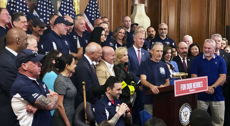 Entertainer and activist Jon Stewart, speaks at a news conference on behalf of 9/11 victims and families, Friday, July 12, 2019, at the Capitol in Washington